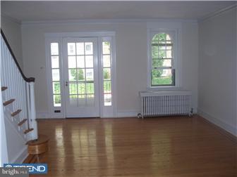 328 Kingston Road Upper Darby, PA 19082 - Photo 3 of 12 an empty room with windows