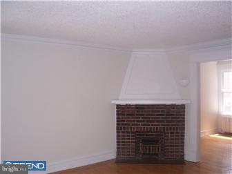 328 Kingston Road Upper Darby, PA 19082 - Photo 4 of 12 a view of fireplace