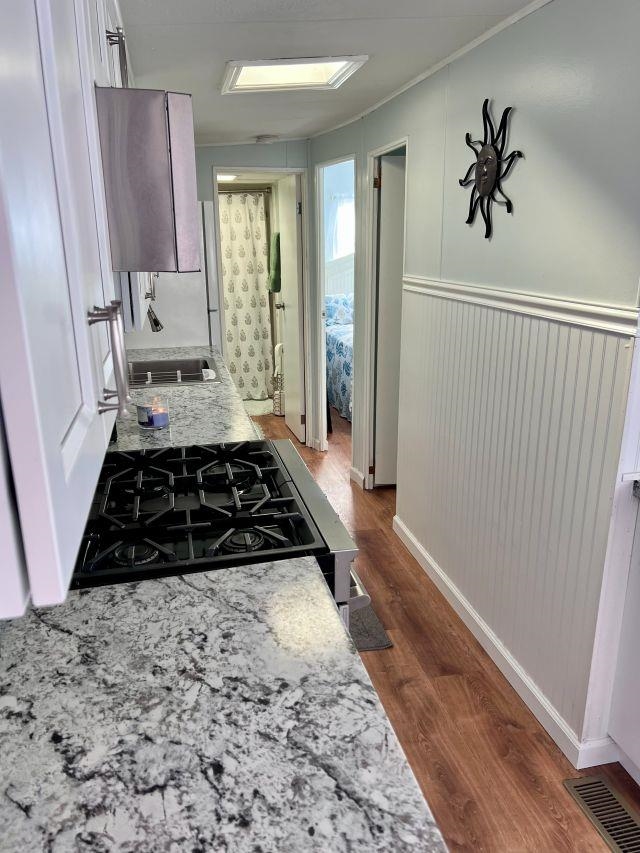 209 Horseshoe, Unit 209 Ocean View, NJ 08246 - Photo 11 of 19 a bathroom with a sink and a shower