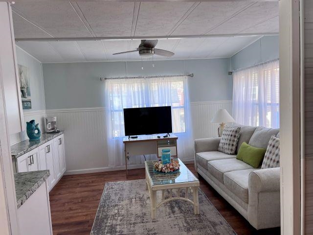 209 Horseshoe, Unit 209 Ocean View, NJ 08246 - Photo 12 of 19 a living room with furniture and a flat screen tv