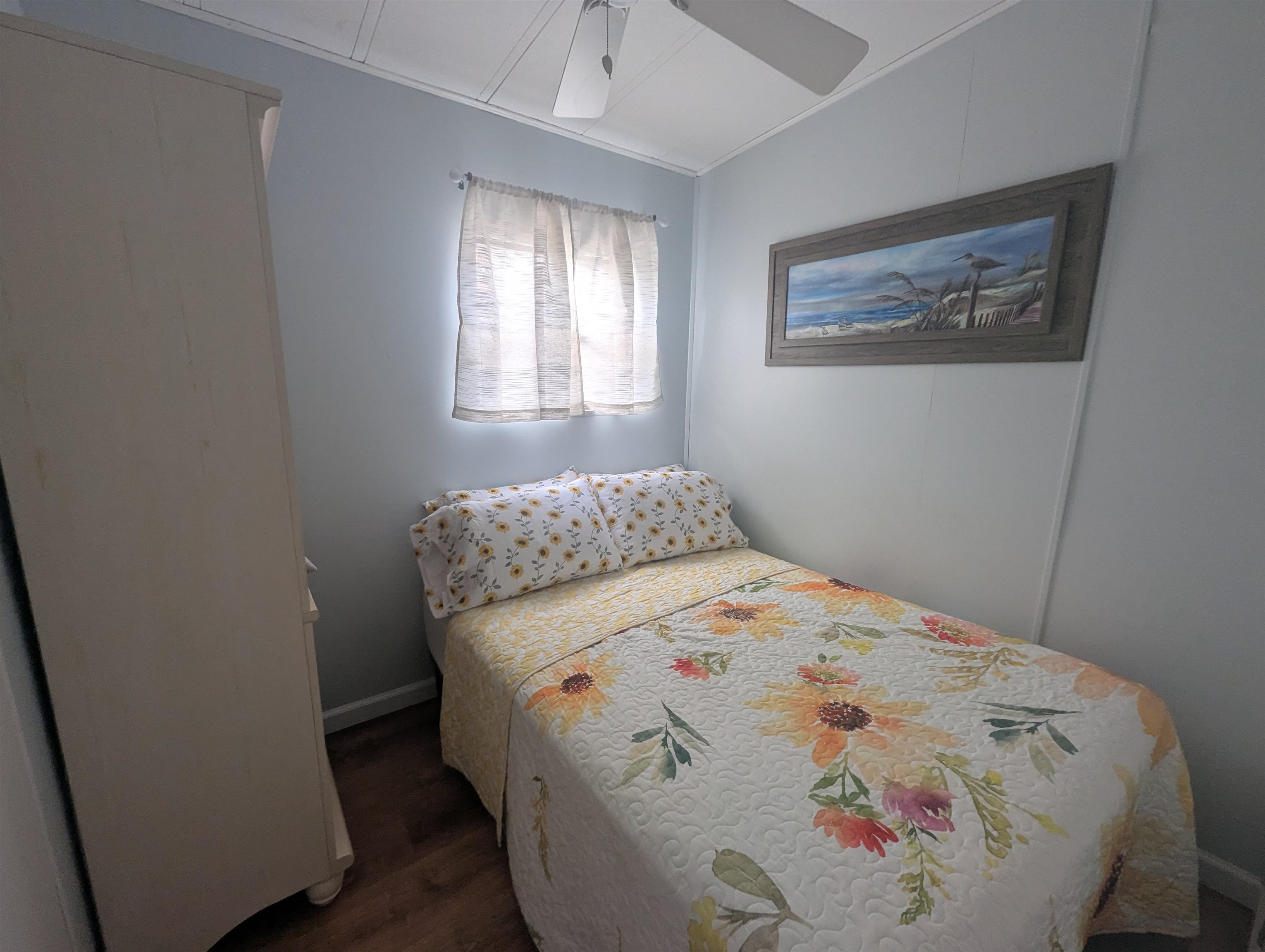 209 Horseshoe, Unit 209 Ocean View, NJ 08246 - Photo 16 of 19 a bedroom with a bed and a window