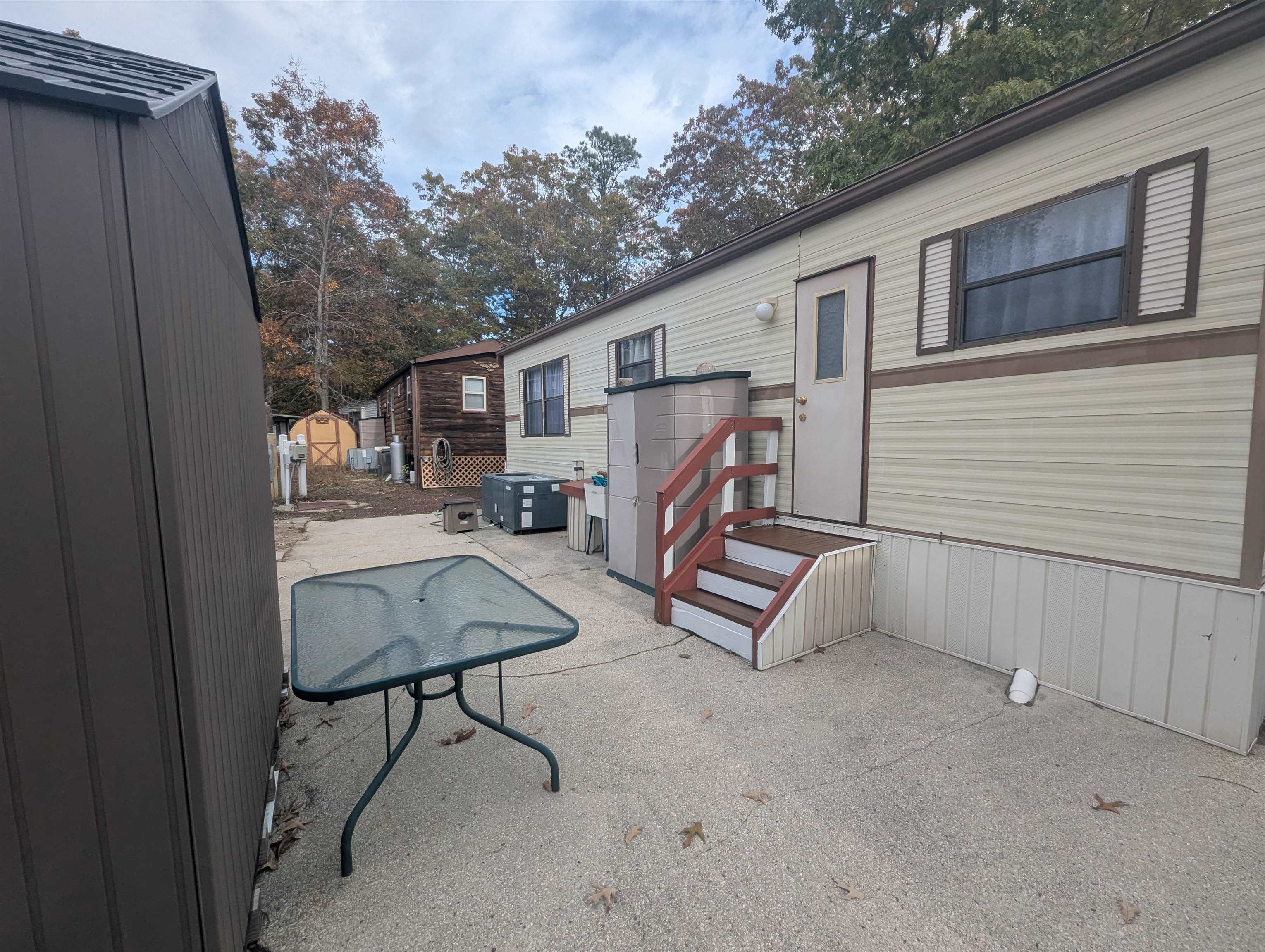 209 Horseshoe, Unit 209 Ocean View, NJ 08246 - Photo 18 of 19 a view of backyard with a table and chairs