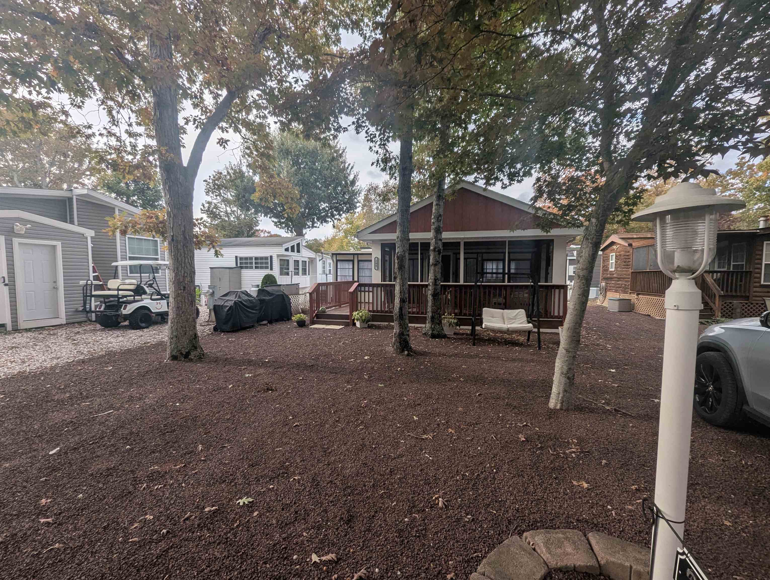 209 Horseshoe, Unit 209 Ocean View, NJ 08246 - Photo 19 of 19 a front view of a house with a yard