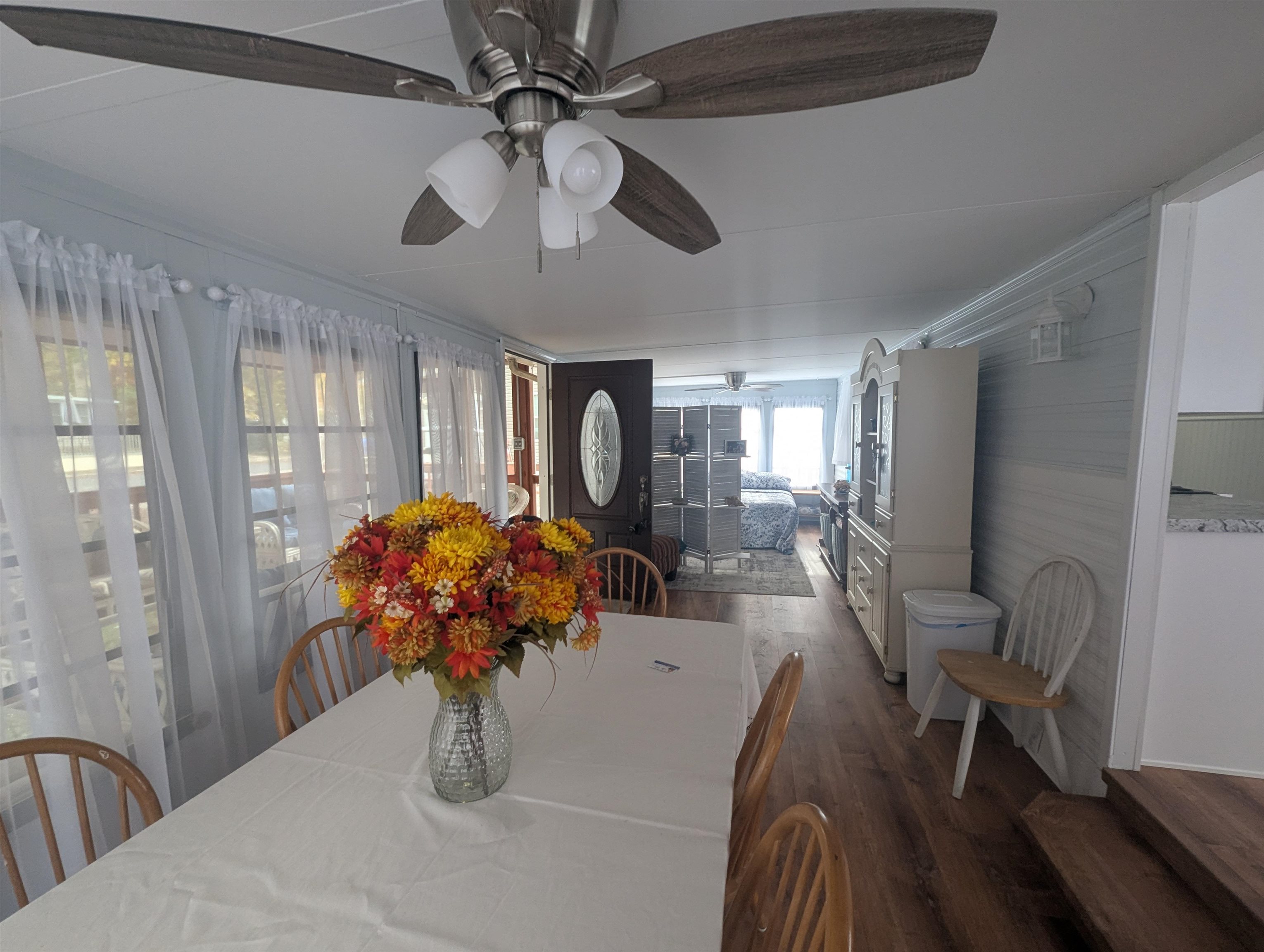 209 Horseshoe, Unit 209 Ocean View, NJ 08246 - Photo 5 of 19 a dining room with furniture and wooden floor