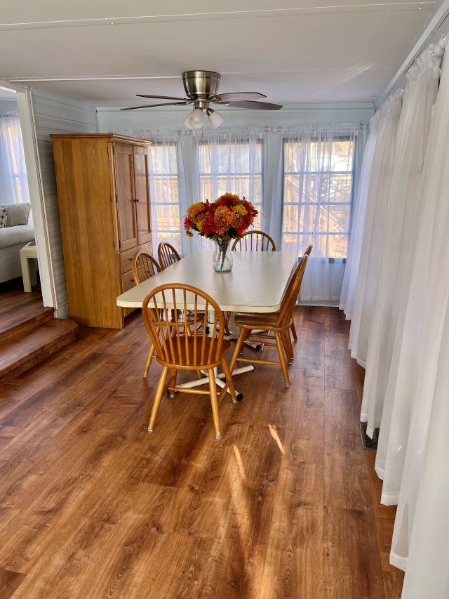 209 Horseshoe, Unit 209 Ocean View, NJ 08246 - Photo 6 of 19 a dining room with furniture and window