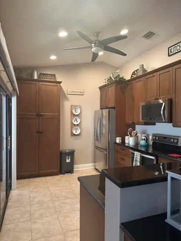 a bedroom with a bed and a table