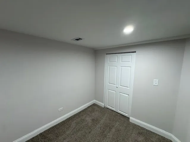 an empty room with closet