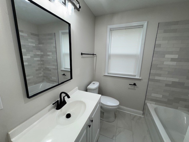10454 South Forest Avenue Chicago, IL 60628 - Photo 8 of 16 a bathroom with a sink and a mirror