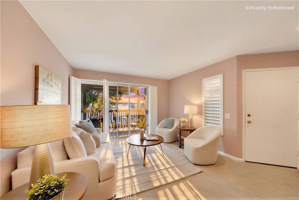 a living room with furniture and a table