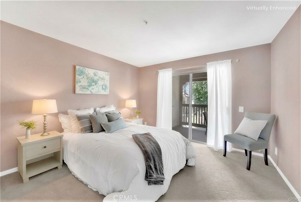 104 South Cross Creek Road, Unit M Orange, CA 92869 - Photo 12 of 34 a bedroom with bed and a large window