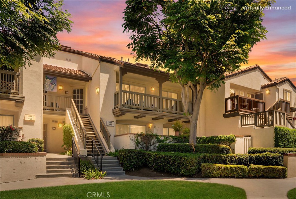 104 South Cross Creek Road, Unit M Orange, CA 92869 - Photo 19 of 34 a front view of a house with garden