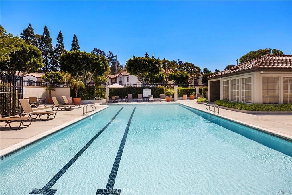 104 South Cross Creek Road, Unit M Orange, CA 92869 - Photo 23 of 34 a view of a house with swimming pool and sitting area