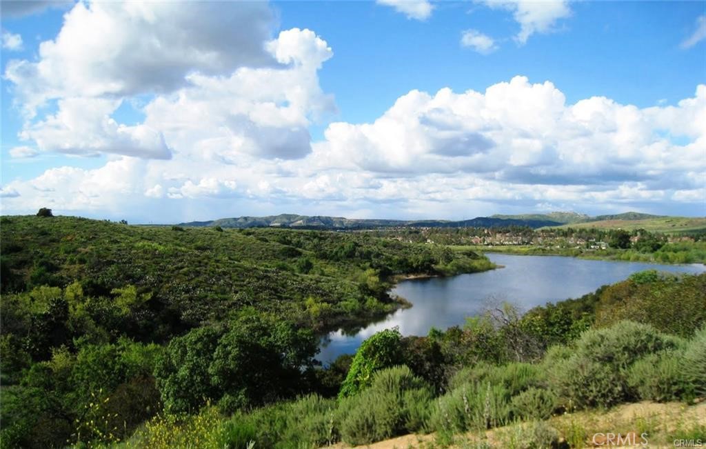 104 South Cross Creek Road, Unit M Orange, CA 92869 - Photo 29 of 34 a view of a lake in middle of the town
