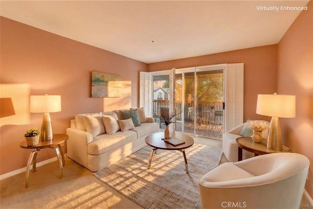 104 South Cross Creek Road, Unit M Orange, CA 92869 - Photo 7 of 34 a living room with furniture and a large window