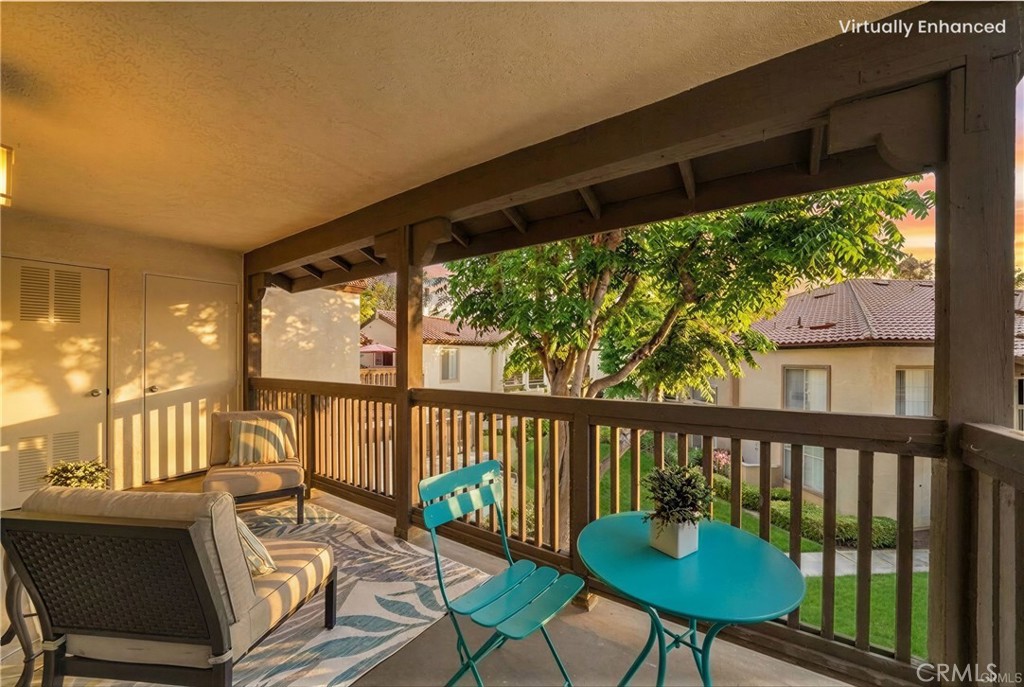 104 South Cross Creek Road, Unit M Orange, CA 92869 - Photo 10 of 34 a view of a balcony with chairs
