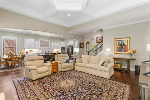 a living room with furniture and a rug