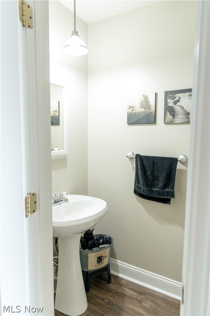 4750 Turney Road Madison, OH 44057 - Photo 15 of 42 Bathroom with wood-type flooring