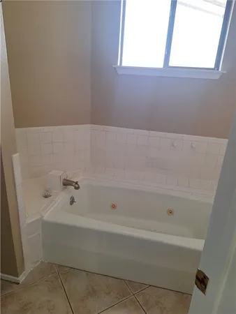a bathroom with a bathtub