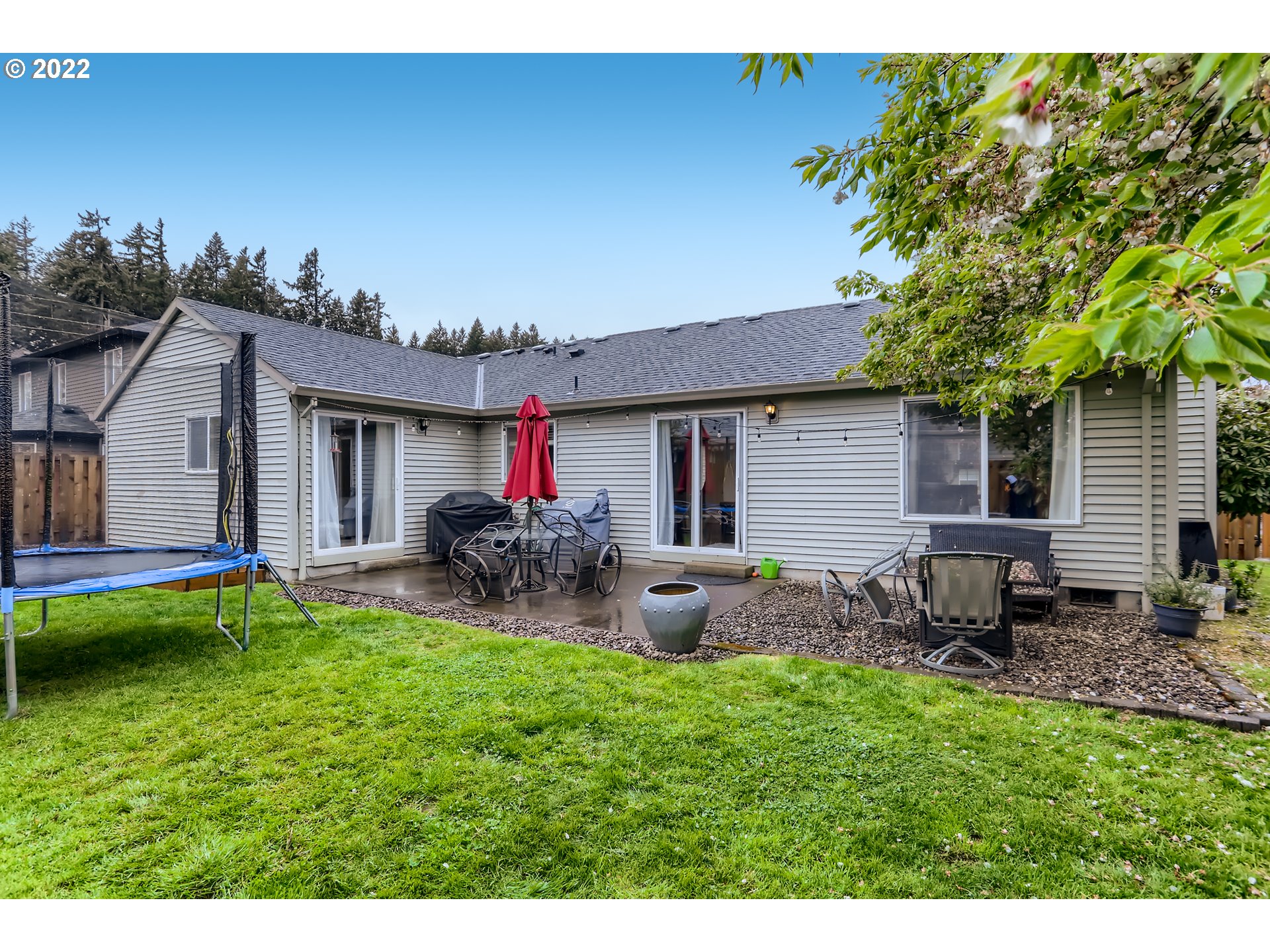1547 Northeast 19th Loop Canby, OR 97013 - Photo 28 of 28 a front view of house with yard and seating area