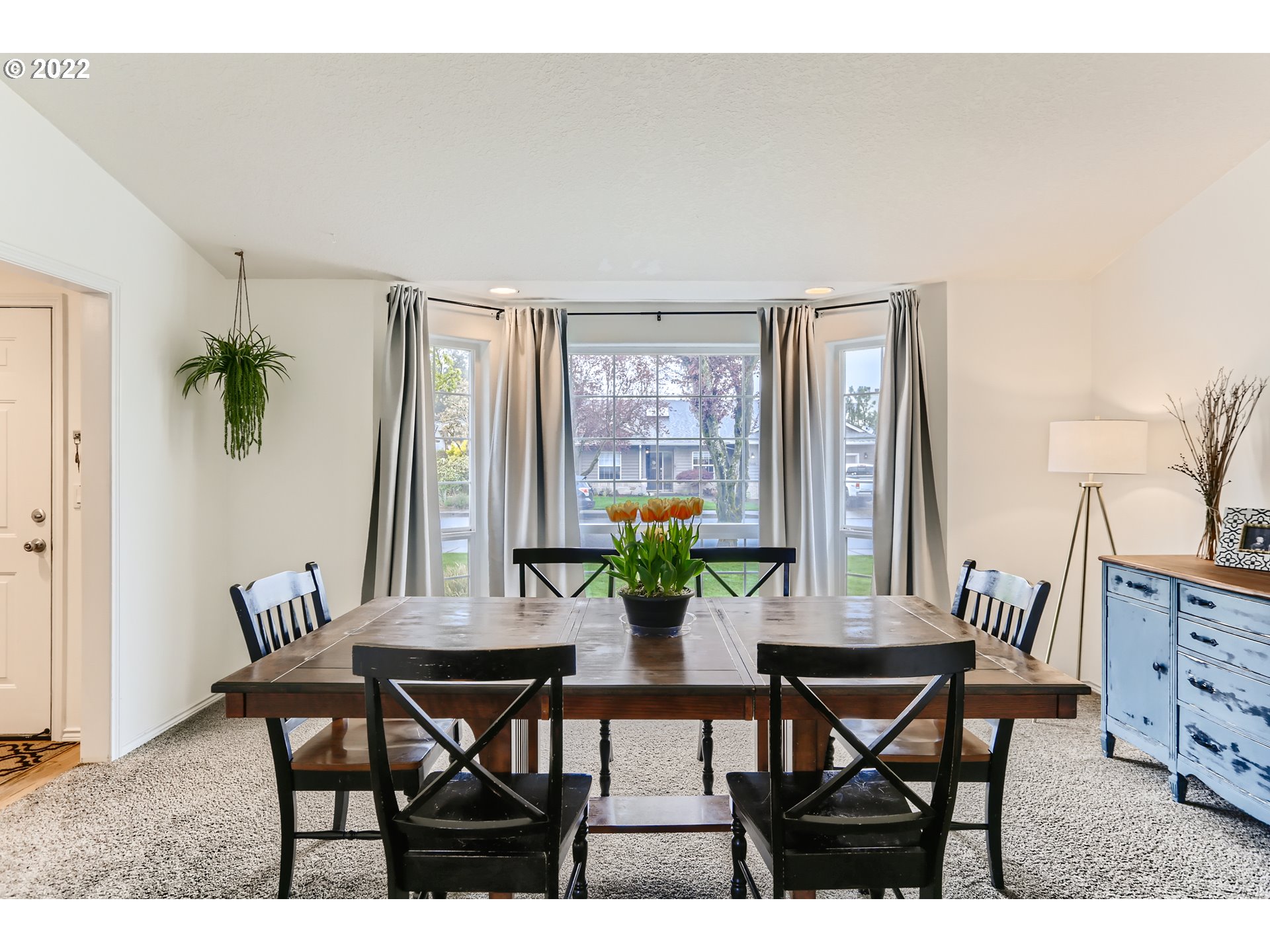 1547 Northeast 19th Loop Canby, OR 97013 - Photo 5 of 28 a view of a dining room with furniture and window