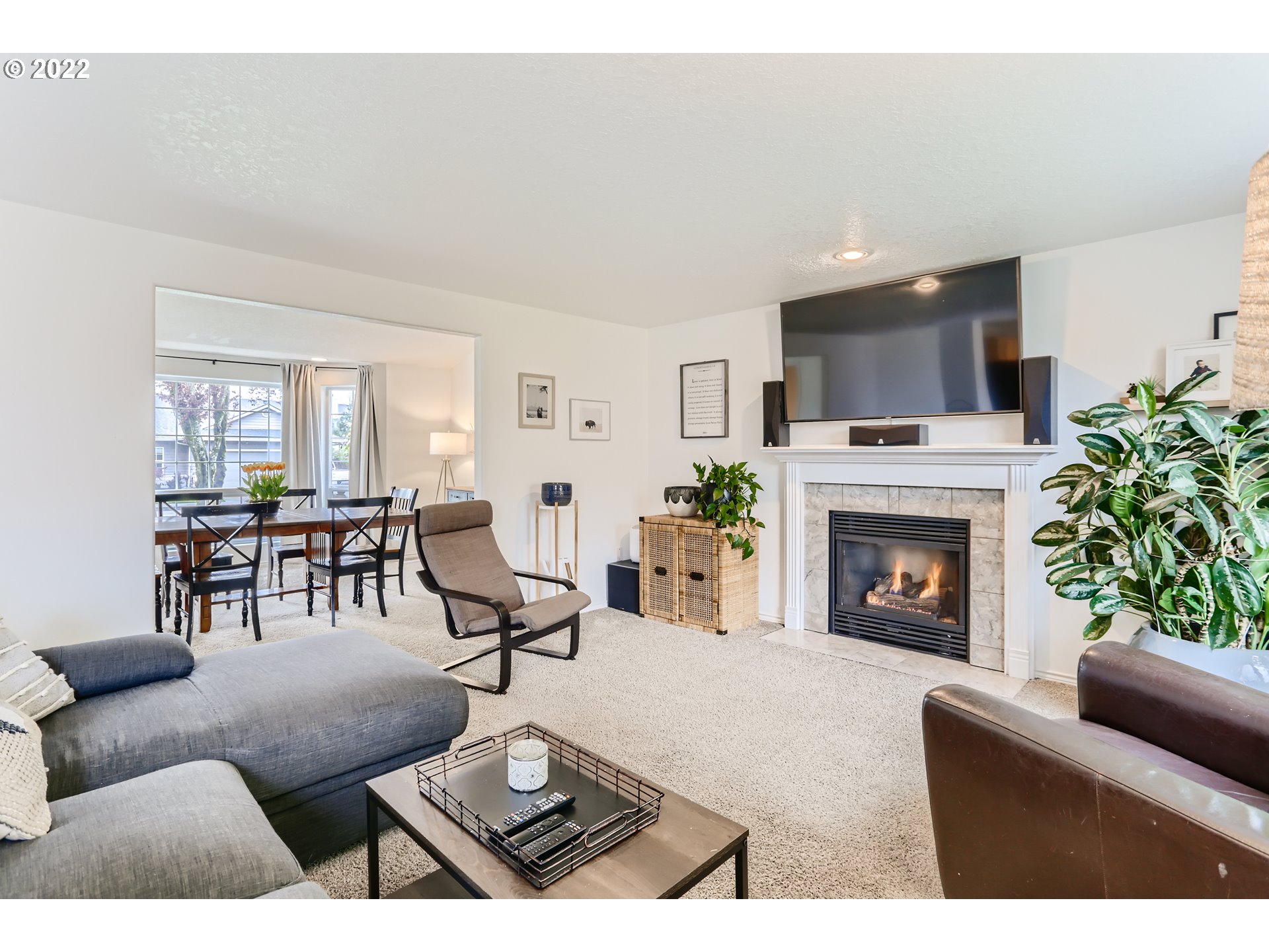 1547 Northeast 19th Loop Canby, OR 97013 - Photo 6 of 28 a living room with furniture and a fireplace