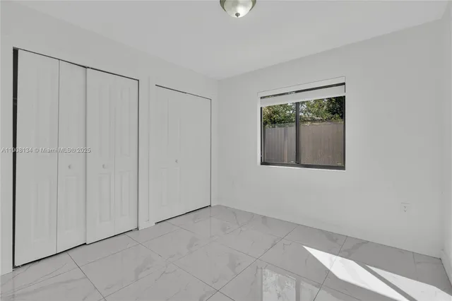 a view of an empty room with window