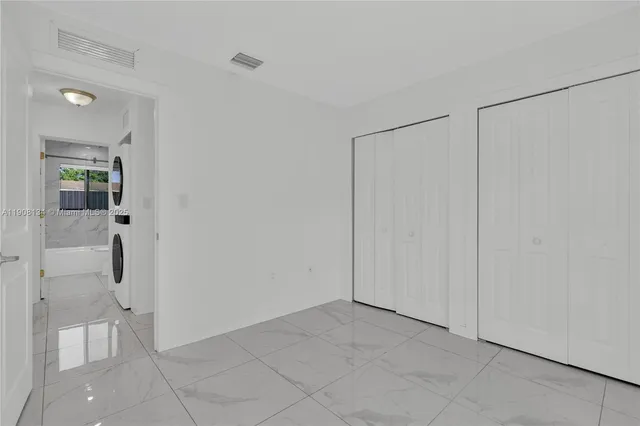 a bathroom with a toilet and a sink