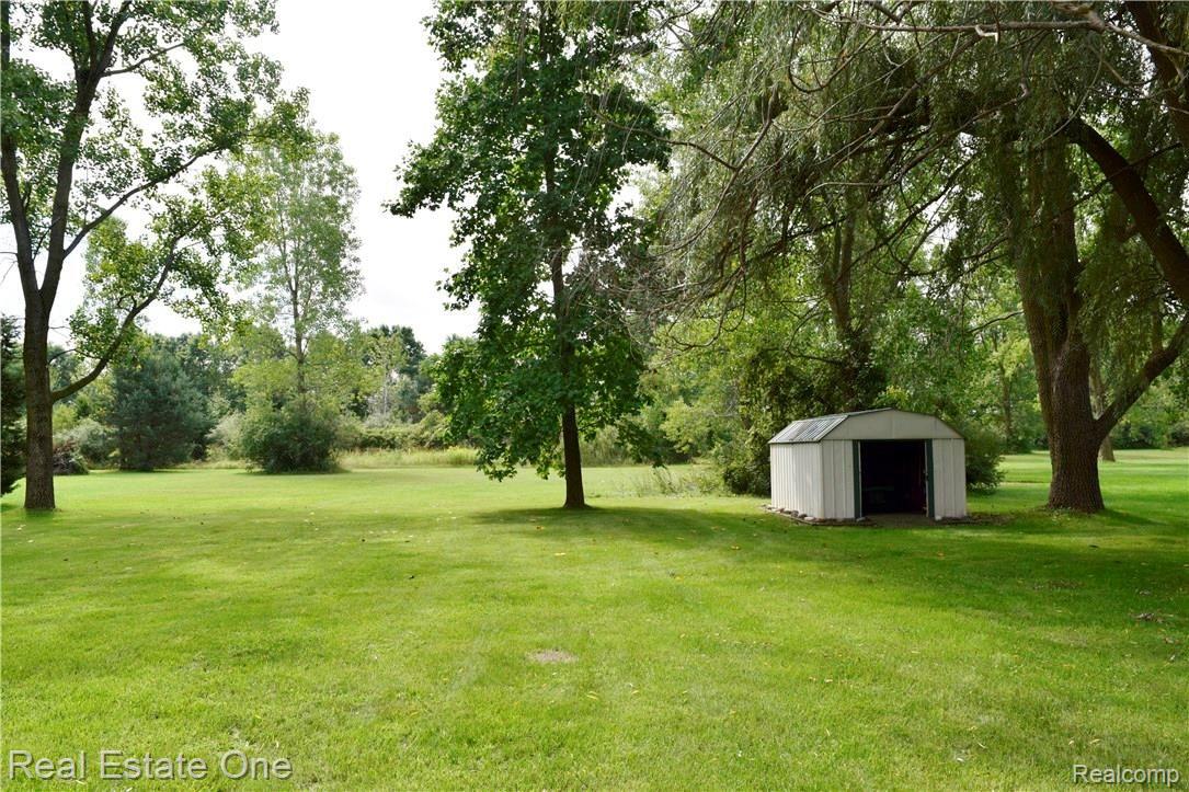 3979 West Maple Road Wixom, MI 48393 - Photo 18 of 18 Park-Like Yard & Shed.JPG