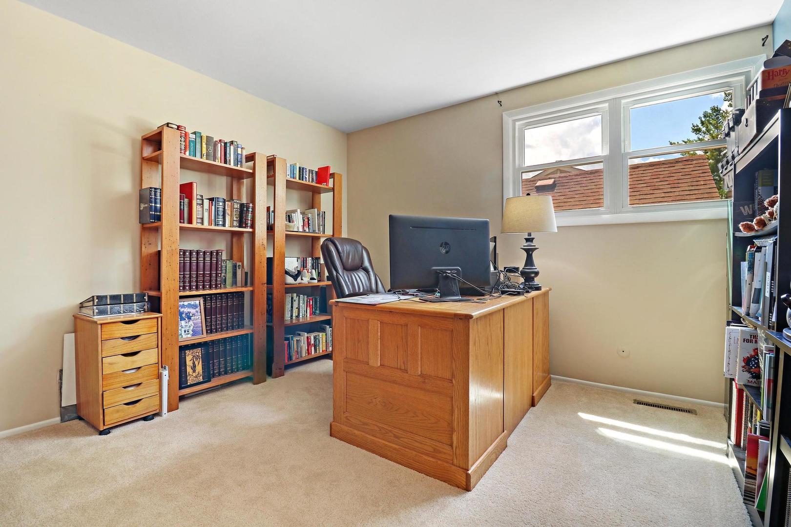 1016 Butler Drive Crystal Lake, IL 60014 - Photo 11 of 20 a room with furniture and storage