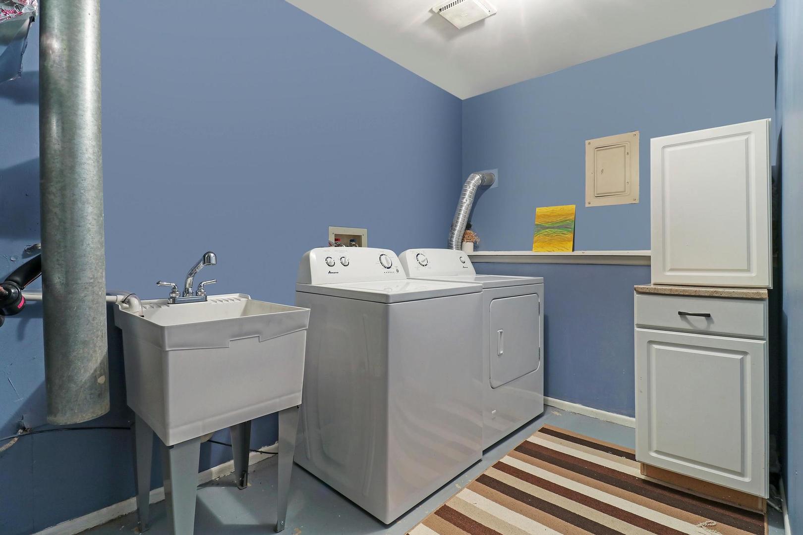 1016 Butler Drive Crystal Lake, IL 60014 - Photo 16 of 20 a utility room with dryer and washer