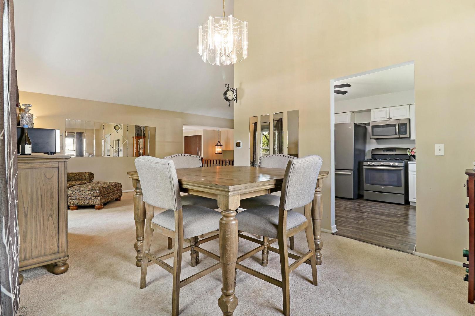 1016 Butler Drive Crystal Lake, IL 60014 - Photo 6 of 20 a view of a dining room with furniture