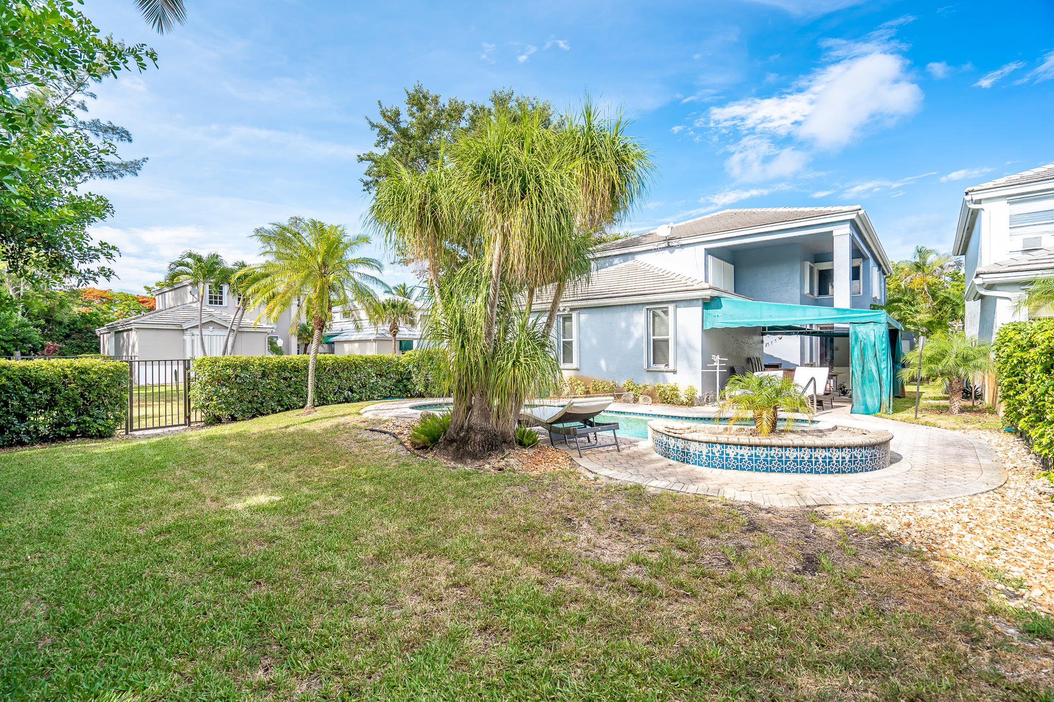 22821 Chelsea Wood Court Boca Raton, FL 33433 - Photo 24 of 43 a view of a house with backyard and sitting area