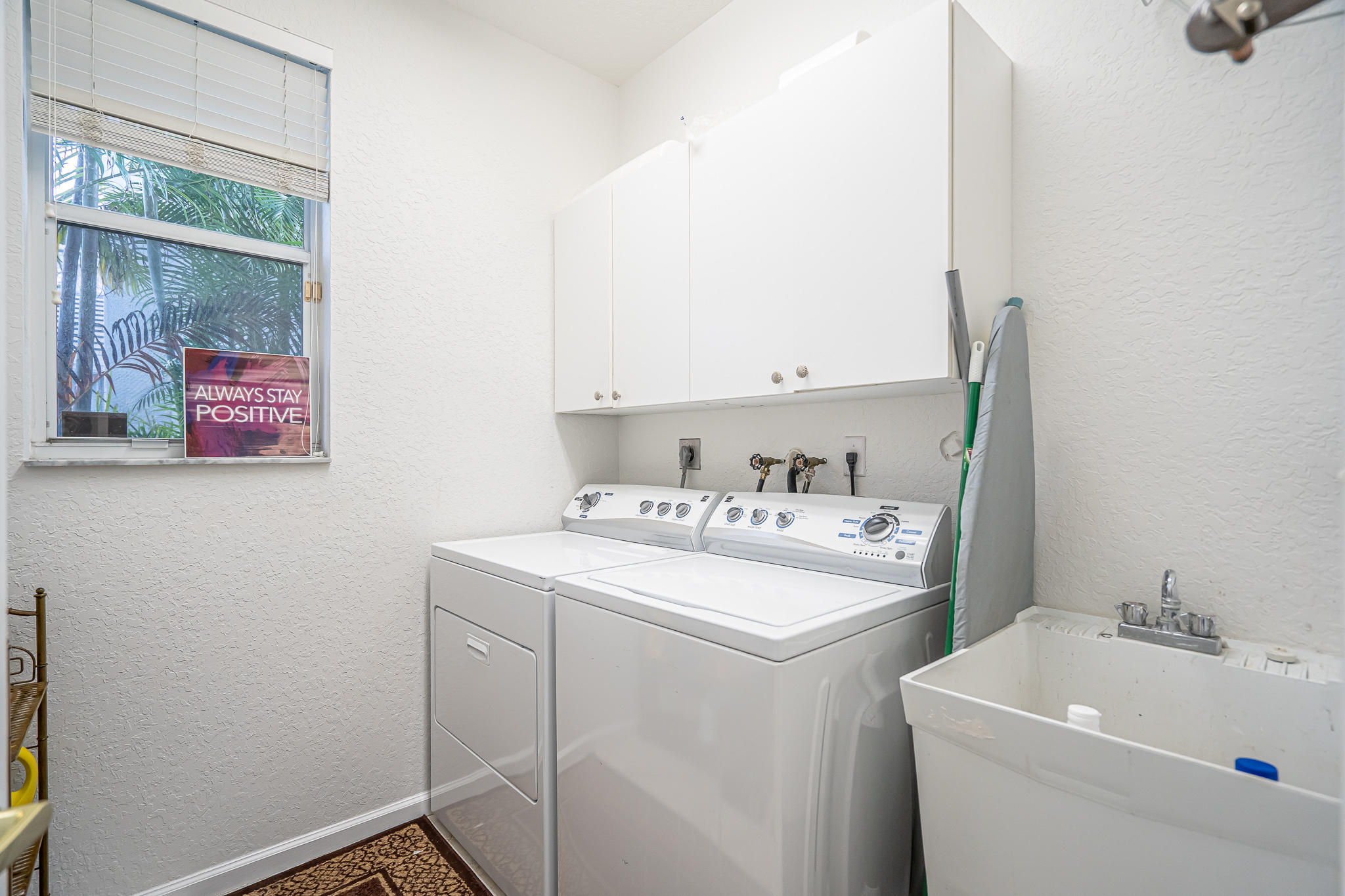 22821 Chelsea Wood Court Boca Raton, FL 33433 - Photo 28 of 43 a utility room with dryer and washer