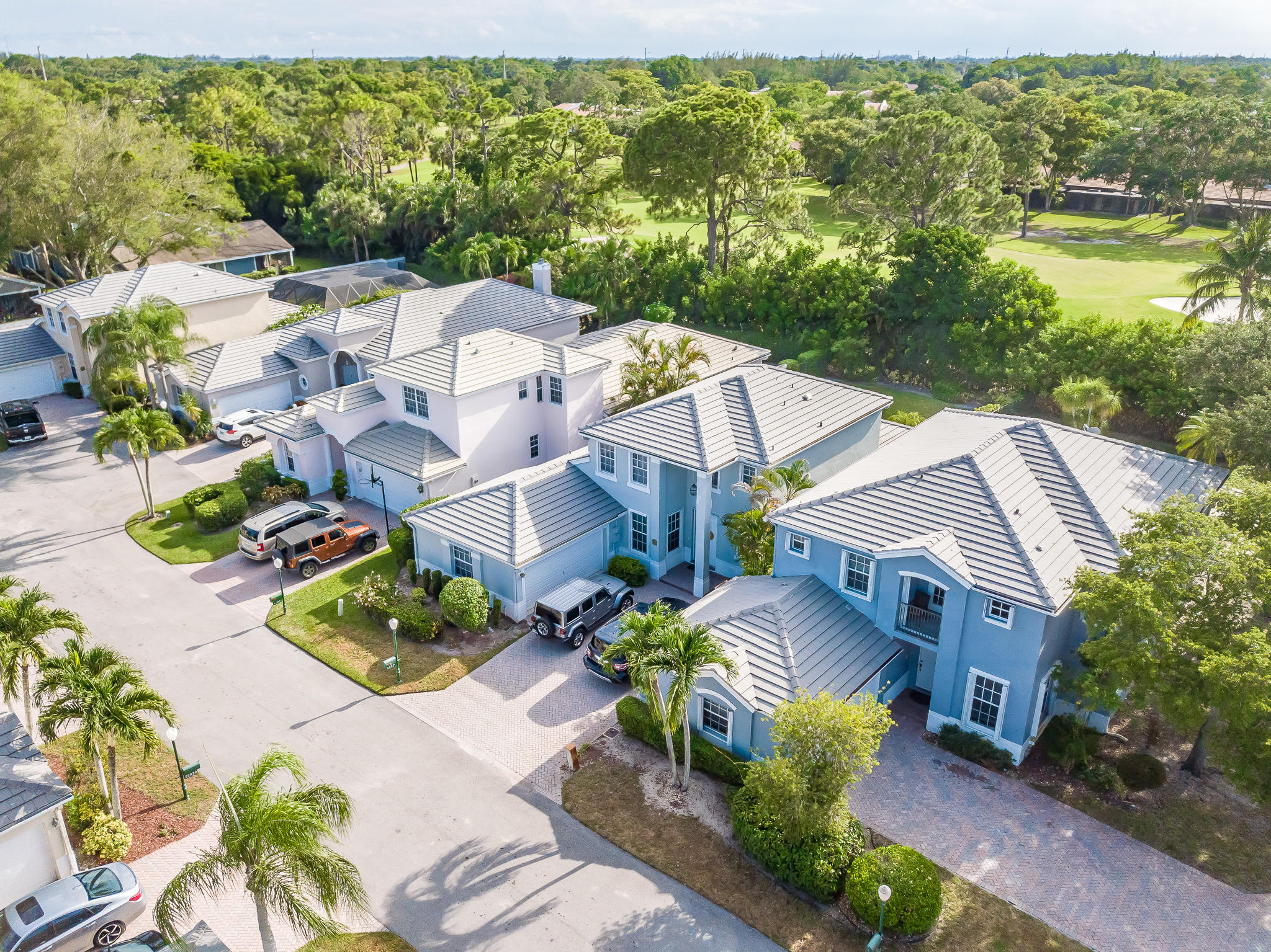 22821 Chelsea Wood Court Boca Raton, FL 33433 - Photo 43 of 43 a aerial view of a house with garden space and a patio