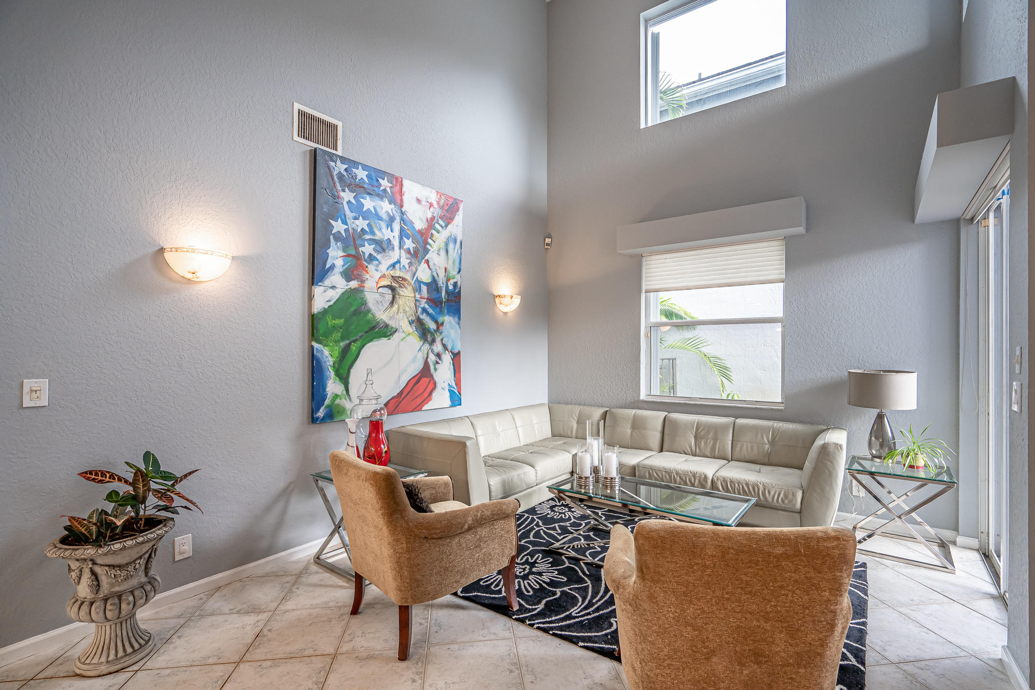 22821 Chelsea Wood Court Boca Raton, FL 33433 - Photo 7 of 43 a living room with furniture and painting on the wall