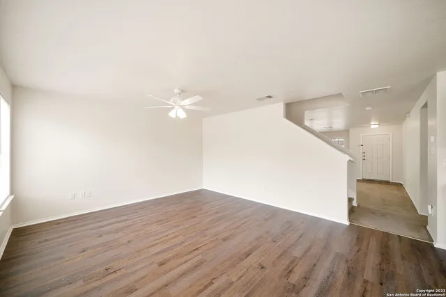 a view of a big room with wooden floor