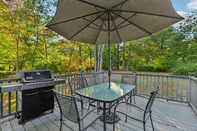 a balcony view with a seating space