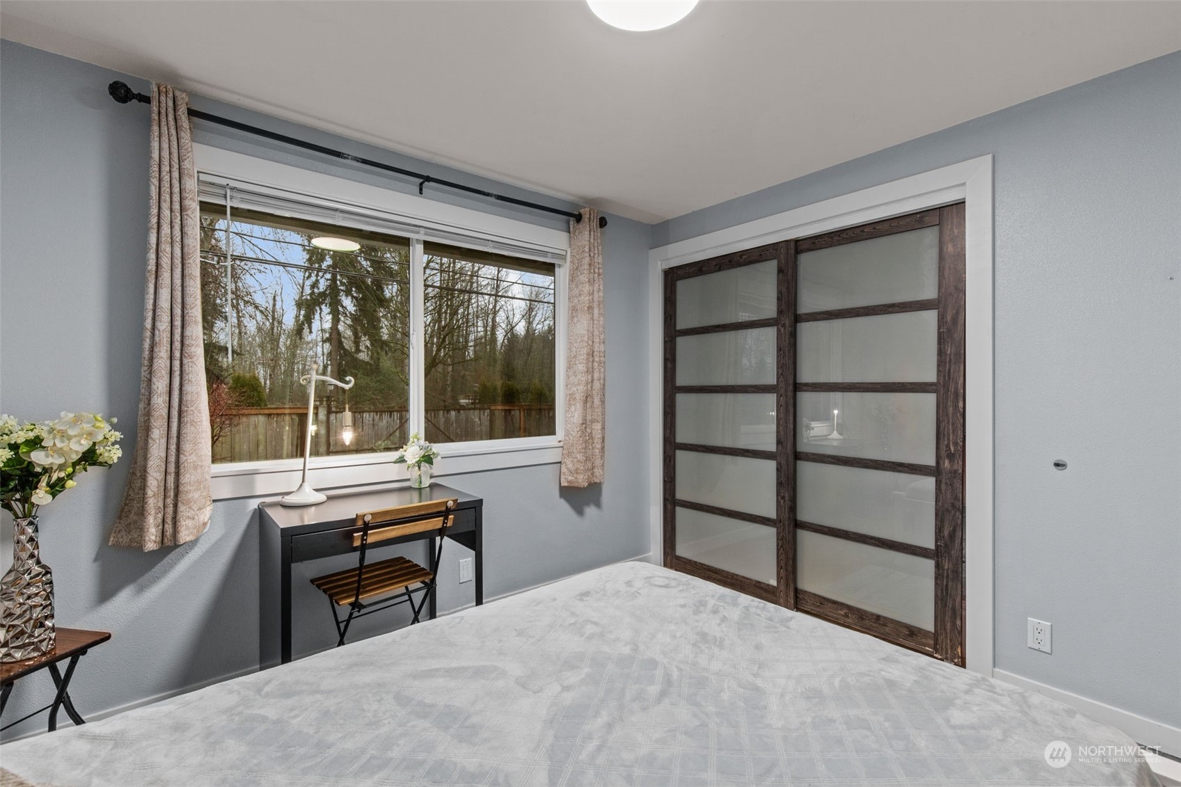 15608 Southeast 128th Street Renton, WA 98059 - Photo 20 of 40 a room with furniture and a window