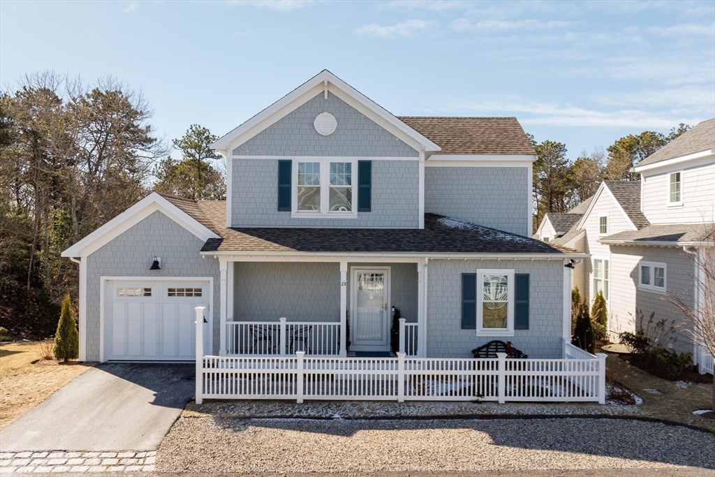 23 Rosewood Circle Mashpee, MA 02649 - Photo 31 of 32 front view of a house with a porch