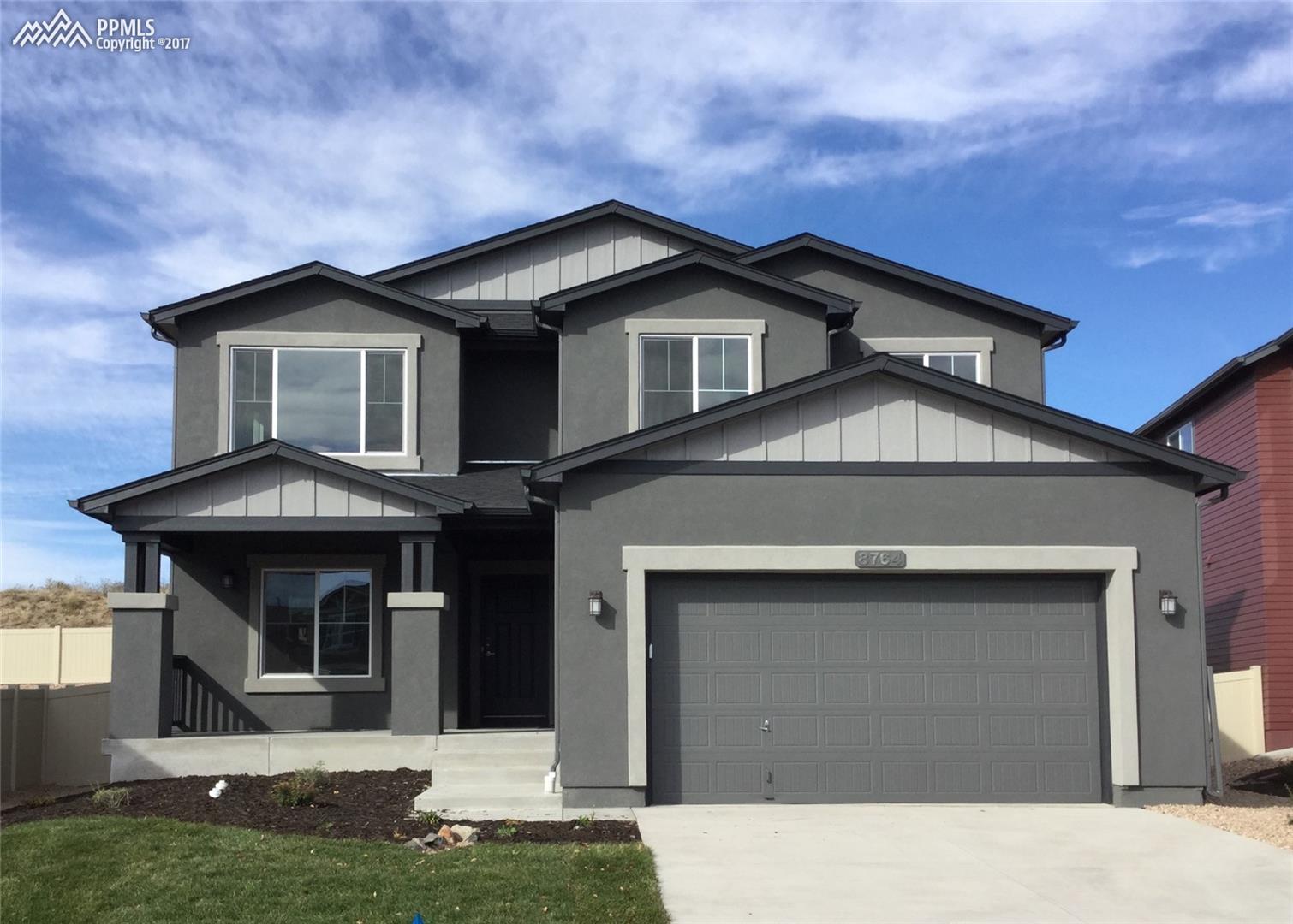 8764 Vanderwood Road Colorado Springs, CO 80908 - Photo 1 of 4 Exterior complete for our newest Award Winning Jackson 2-story home! Complete with 4 bedrooms, office, finished lower level rec room, 3-car garage and much more!