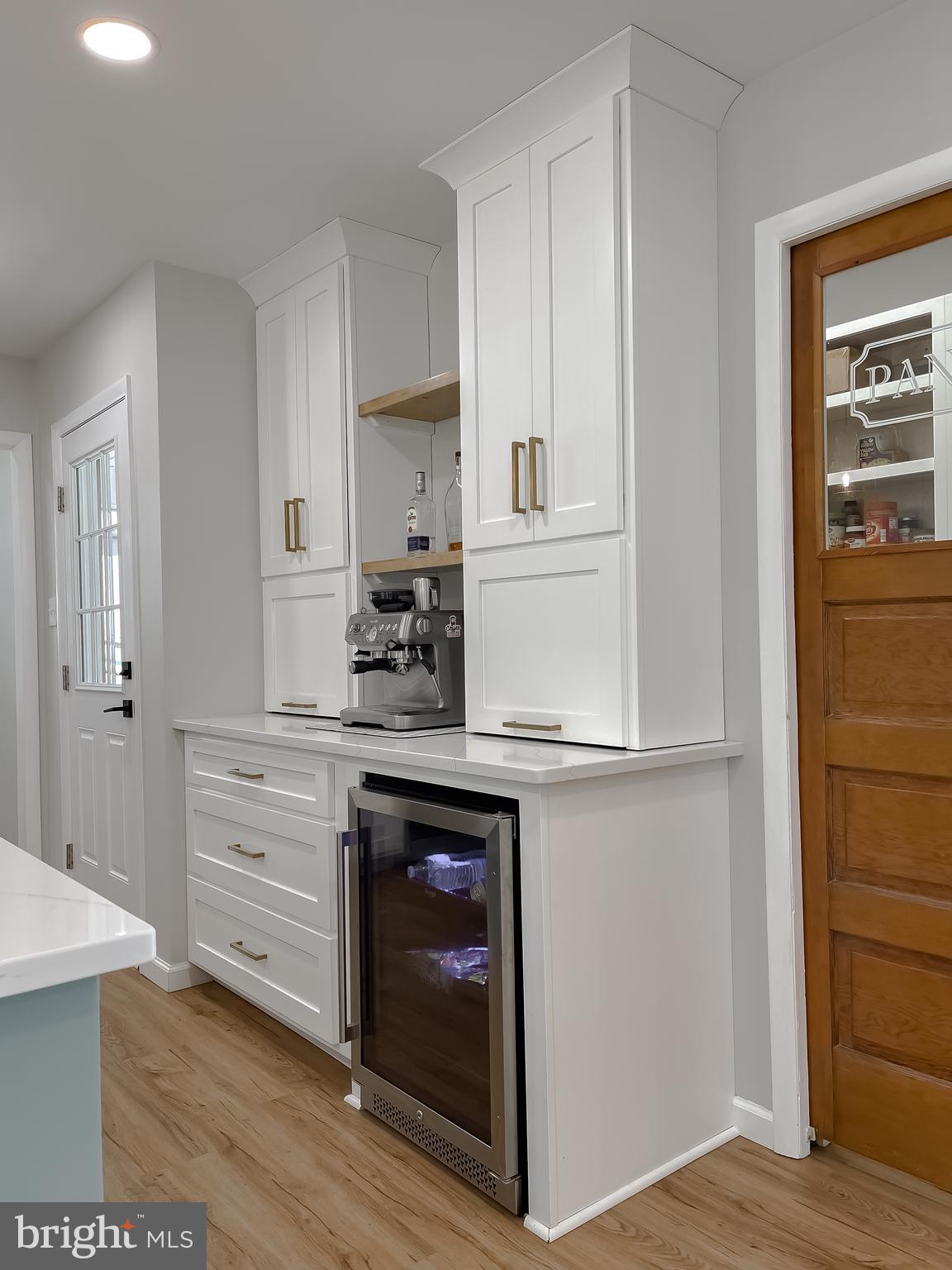 26005 Jones Wharf Road Hollywood, MD 20636 - Photo 30 of 66 a kitchen with stainless steel appliances granite countertop a stove and a refrigerator