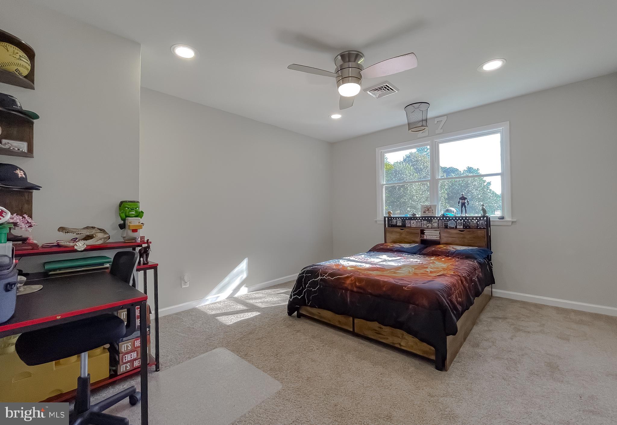 26005 Jones Wharf Road Hollywood, MD 20636 - Photo 41 of 66 a bed room with a bed and a window