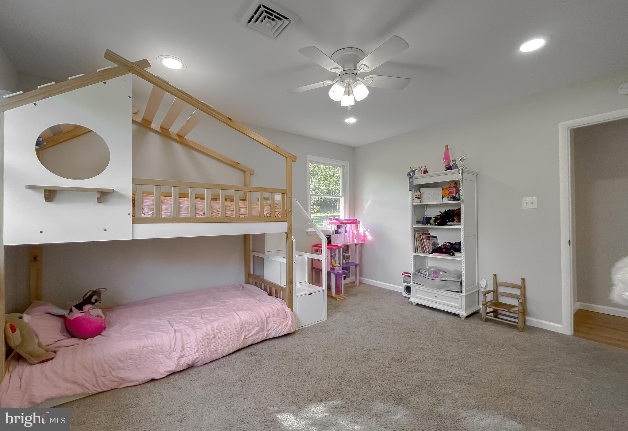 26005 Jones Wharf Road Hollywood, MD 20636 - Photo 56 of 66 a bedroom with a bed and closet
