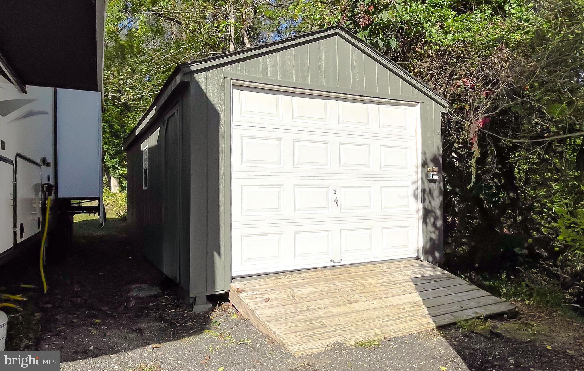26005 Jones Wharf Road Hollywood, MD 20636 - Photo 64 of 66 a small house with a outdoor space