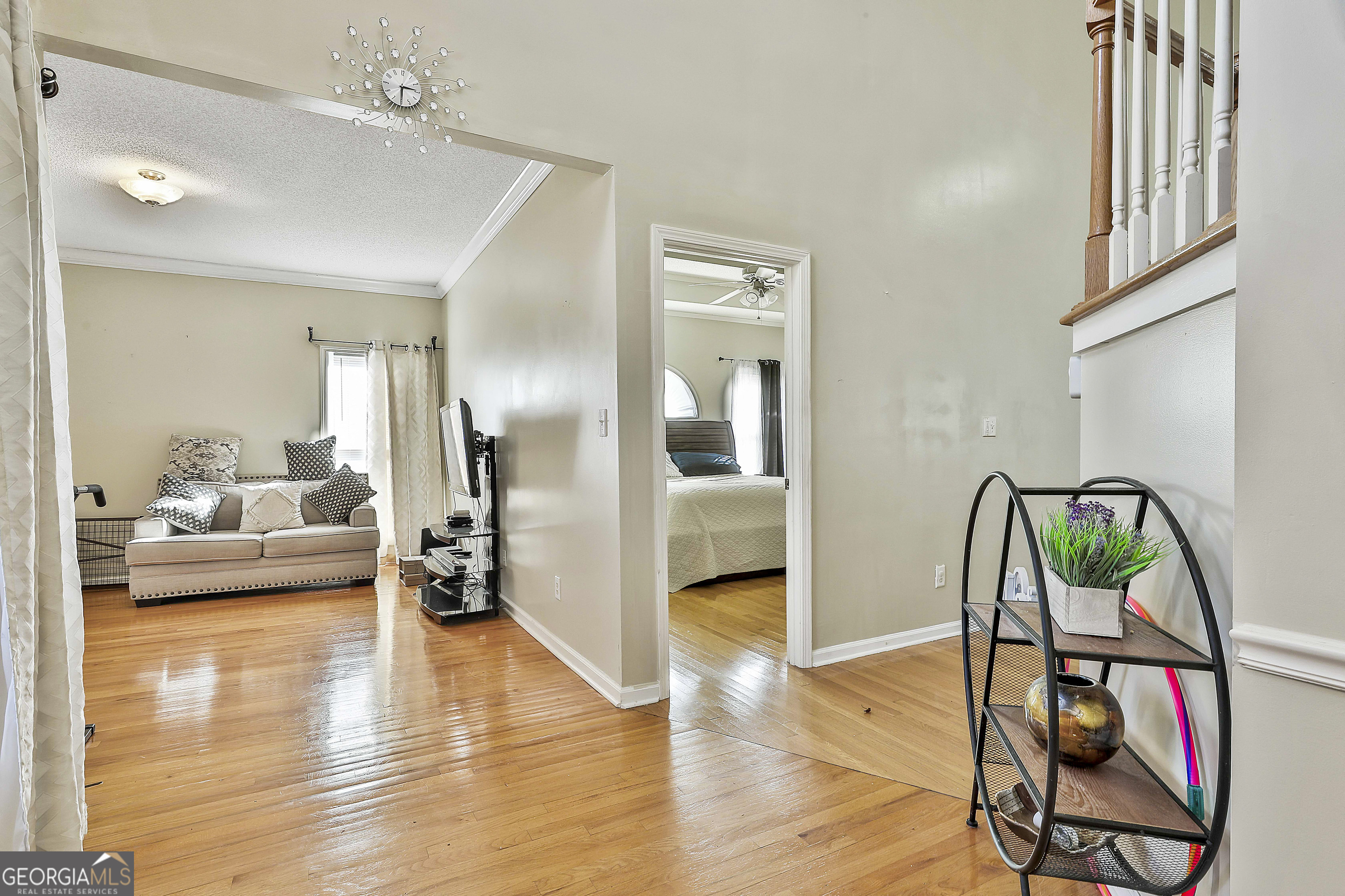 1317 Cheatham Road Griffin, GA 30223 - Photo 13 of 41 a view of a livingroom with furniture and wooden floor