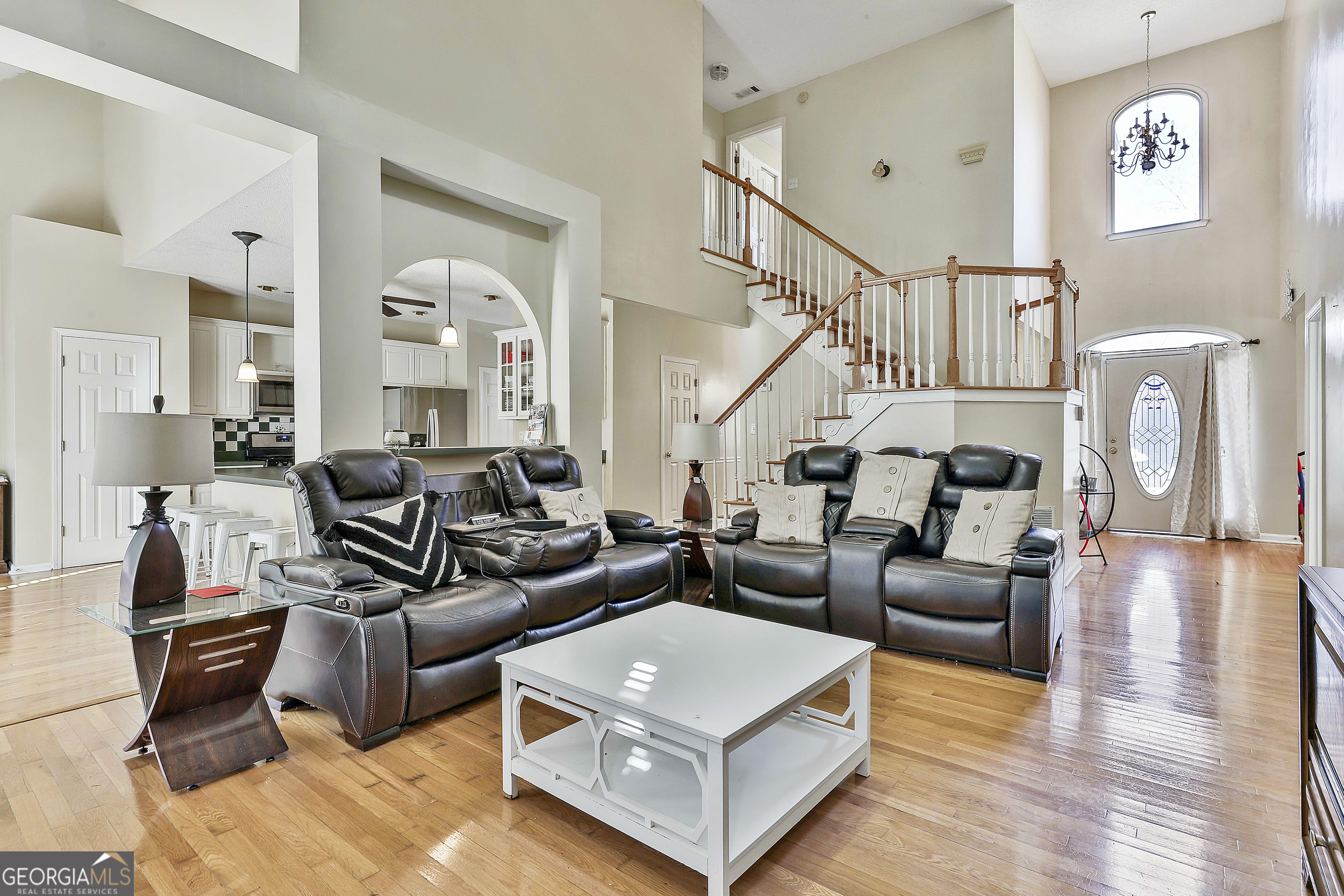 1317 Cheatham Road Griffin, GA 30223 - Photo 24 of 41 a living room with furniture and wooden floor