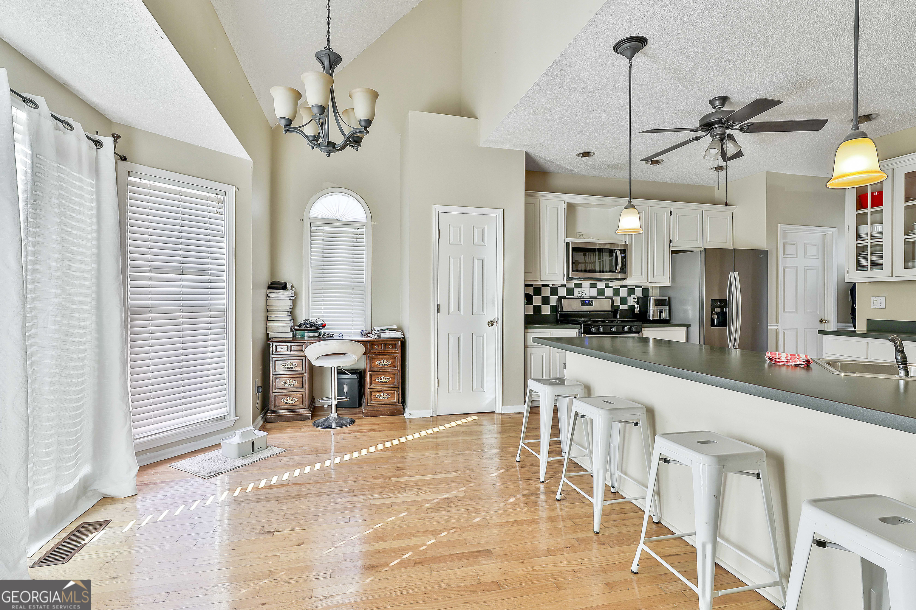 1317 Cheatham Road Griffin, GA 30223 - Photo 25 of 41 a large kitchen with a table and chairs