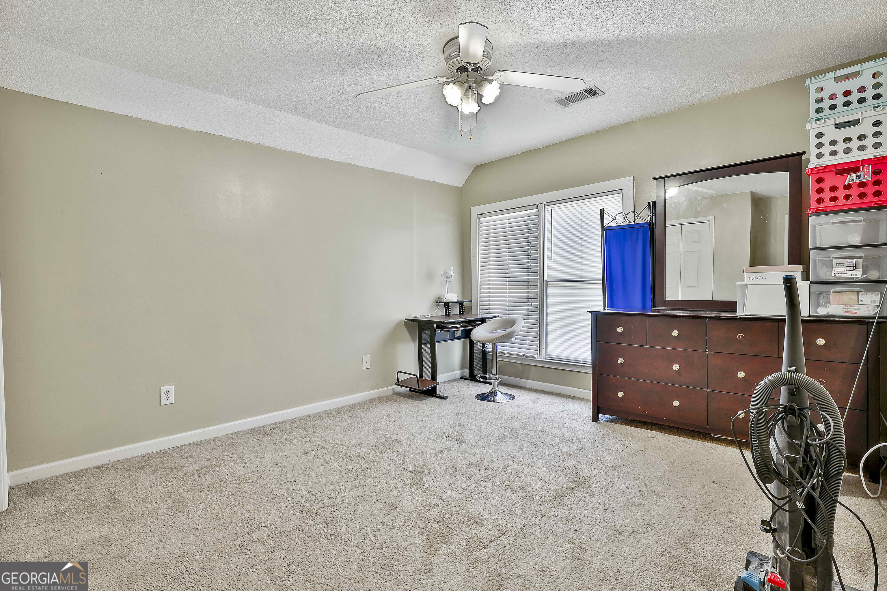 1317 Cheatham Road Griffin, GA 30223 - Photo 32 of 41 a view of workspace with furniture and windows