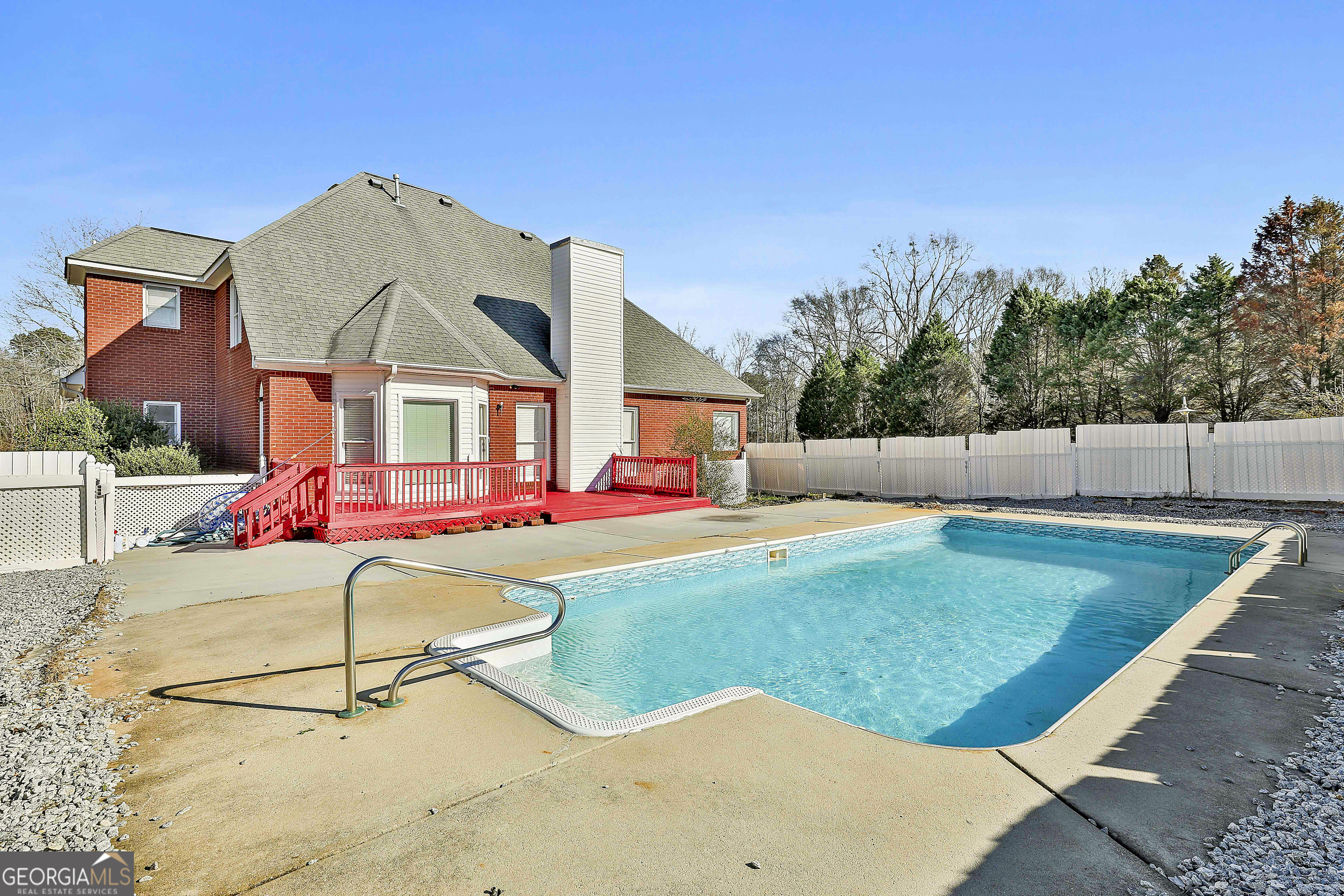 1317 Cheatham Road Griffin, GA 30223 - Photo 39 of 41 a view of a white house in a yard