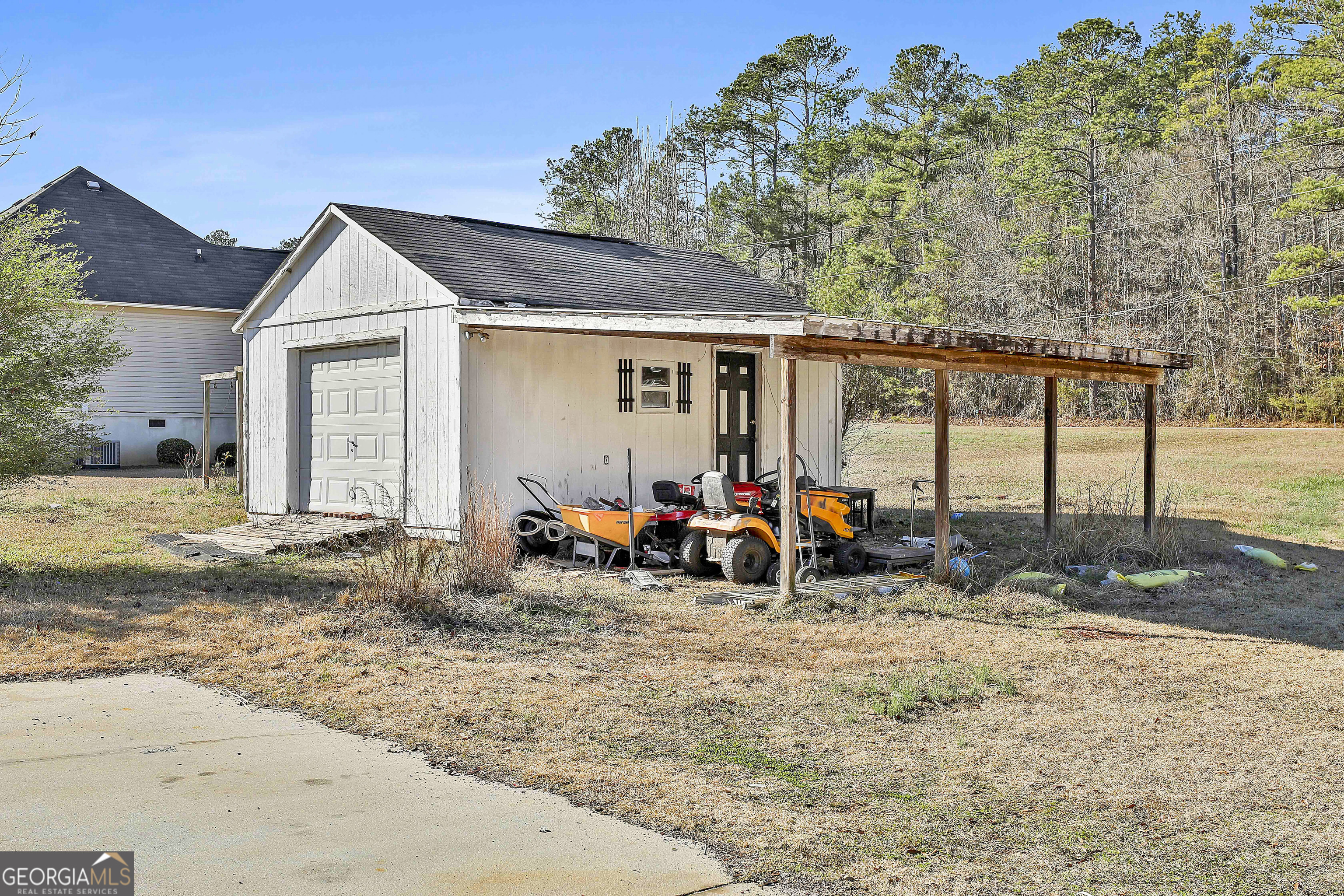 1317 Cheatham Road Griffin, GA 30223 - Photo 41 of 41 a view of a house with a patio